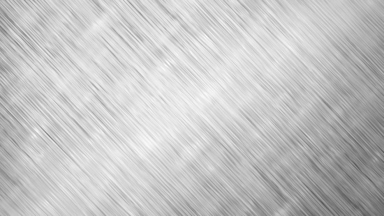 Brushed aluminum architectural surface in soft light